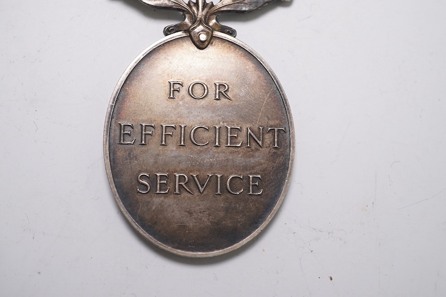 Three assorted service medals; Ed VII Volunteer Officer's Decoration hallmarked for 1905; GV Imperial Service medal to Walter Charles Cornish; GVI Territorial Efficiency medal to 2062789 . S/Sgt. L.W.Sergeant. R.A. Condi